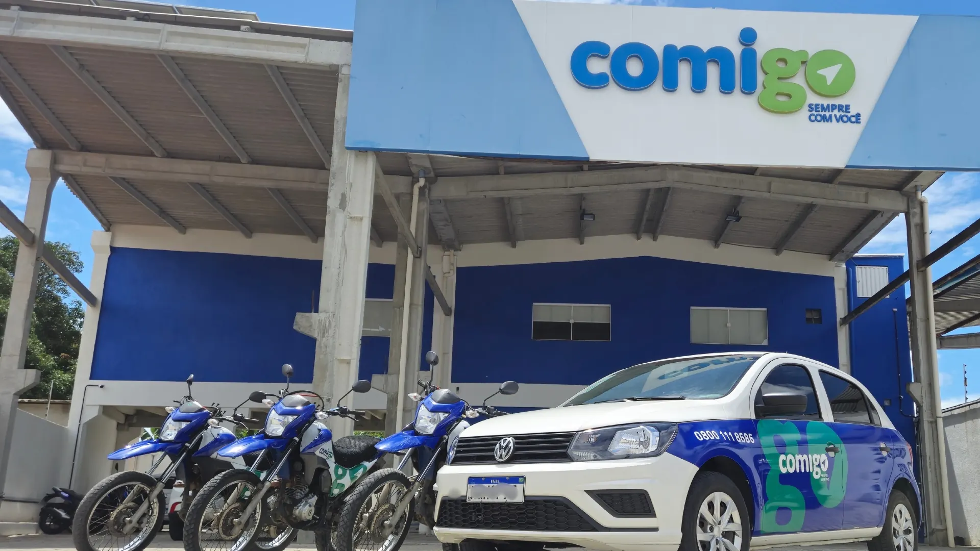 Fachada e frota da Comigo — soluções de seguros veiculares e mais